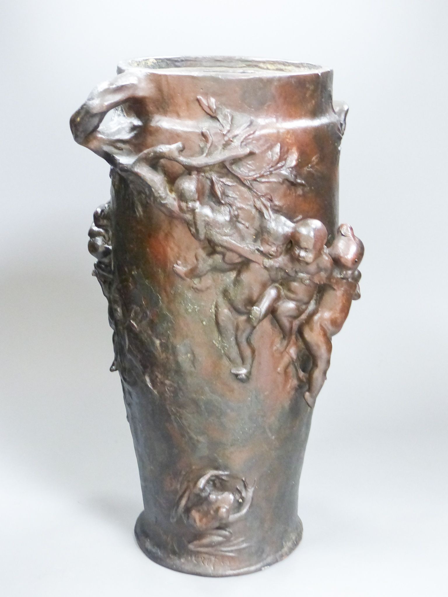 After G.J. Cheret. An Art Nouveau style bronze vase